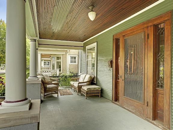 A Sweeping Front Porch to enjoy on lazy afternoons, for an evening glass of wine or to simply watch the world go by.