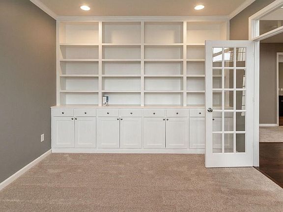 Custom Built-in shelves and cabinets gives a classic look with great storage.
