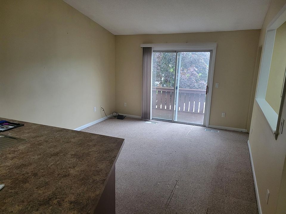 Living Room (New Rugs will be installed prior to move in date)
