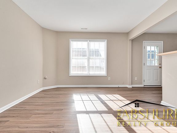 First floor living room with luxury vinyl plank flooring