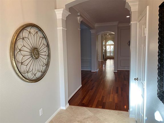 High ceilings in the entry with beautiful tile floors.