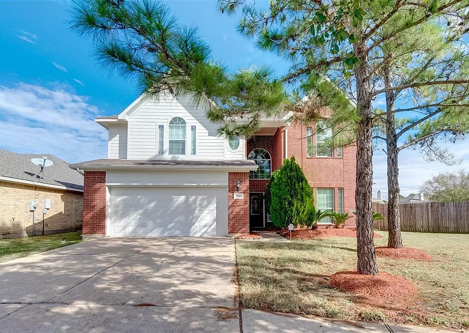 Shady trees situated in a round about cul-de-sac, situates this gorgeous 2 story!