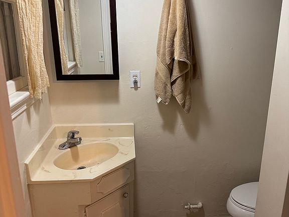 The bathroom with shower stall.