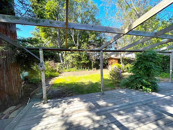 Very private rear fenced yard with 'yoga shed'
