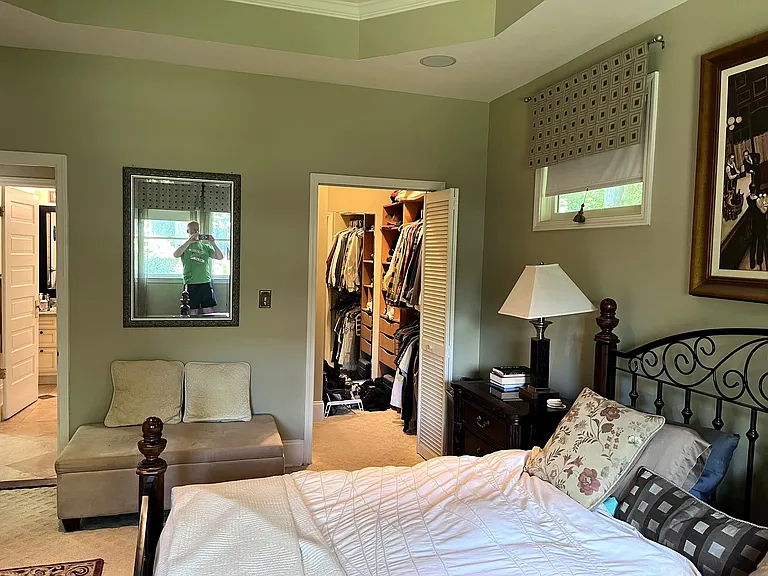 Master bedroom with a walk-in closet.