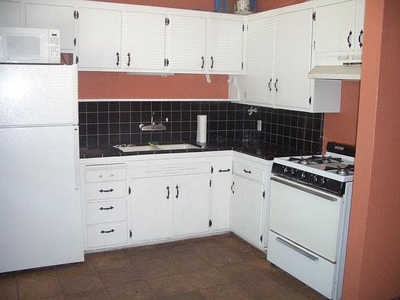 Kitchen with tile counters