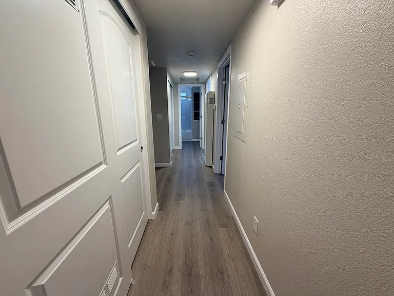 Hallway into bathroom.