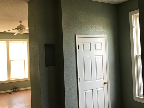 GORGEOUS HARDWOOD FLOORS WITH CEILING FANS - CENTRAL HEATING AND COOLING