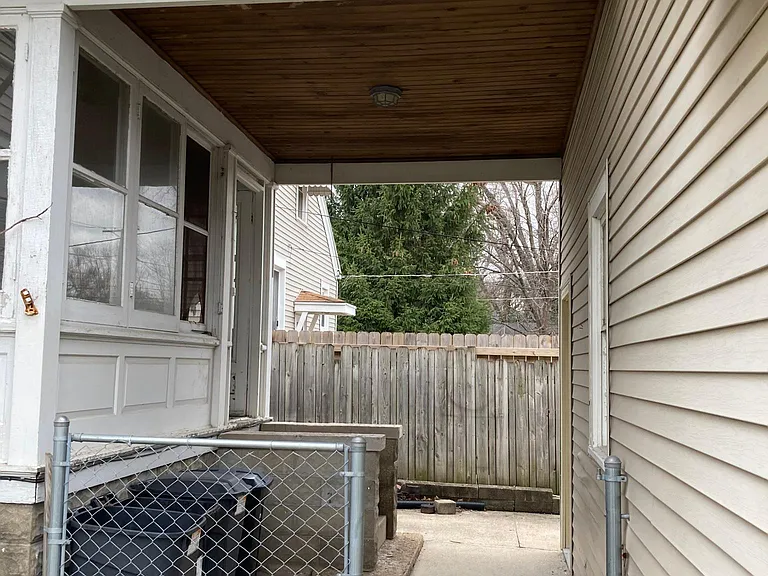 Covered Walk though from garage with vintage ceiling