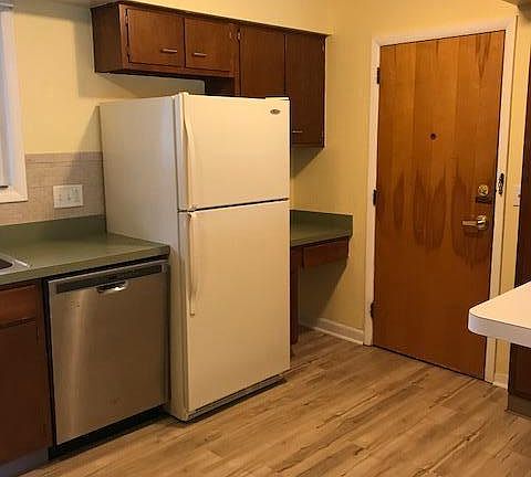 Each apartment has a front entrance and a back entrance into