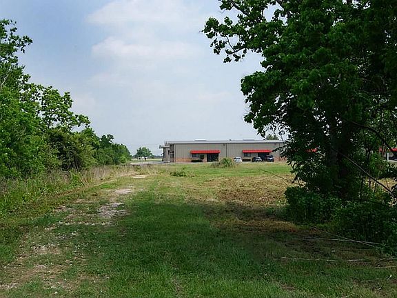 There is the front of the property that is "L" shaped.  There is a "tear down " on the property that is to the right