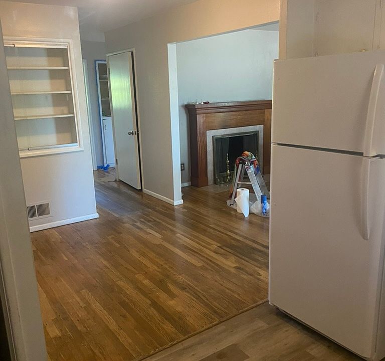 From the kitchen looking to the dining area and the living room