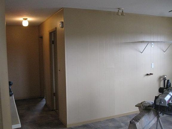 North wall of laundry & hall to bathroom
