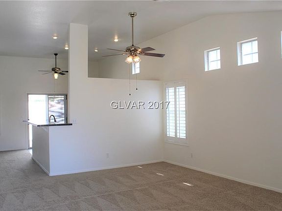 SPACIOUS LIVING ROOM WITH VAULTED CEILING!