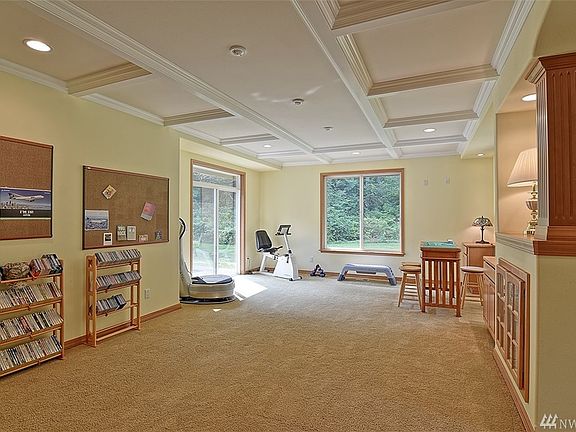 Extra large rec room offers space for great entertaining! Host game night, set up a billiards table, formal dining, the options are endless! Slider puts you out on the patio that goes the full length of the home!