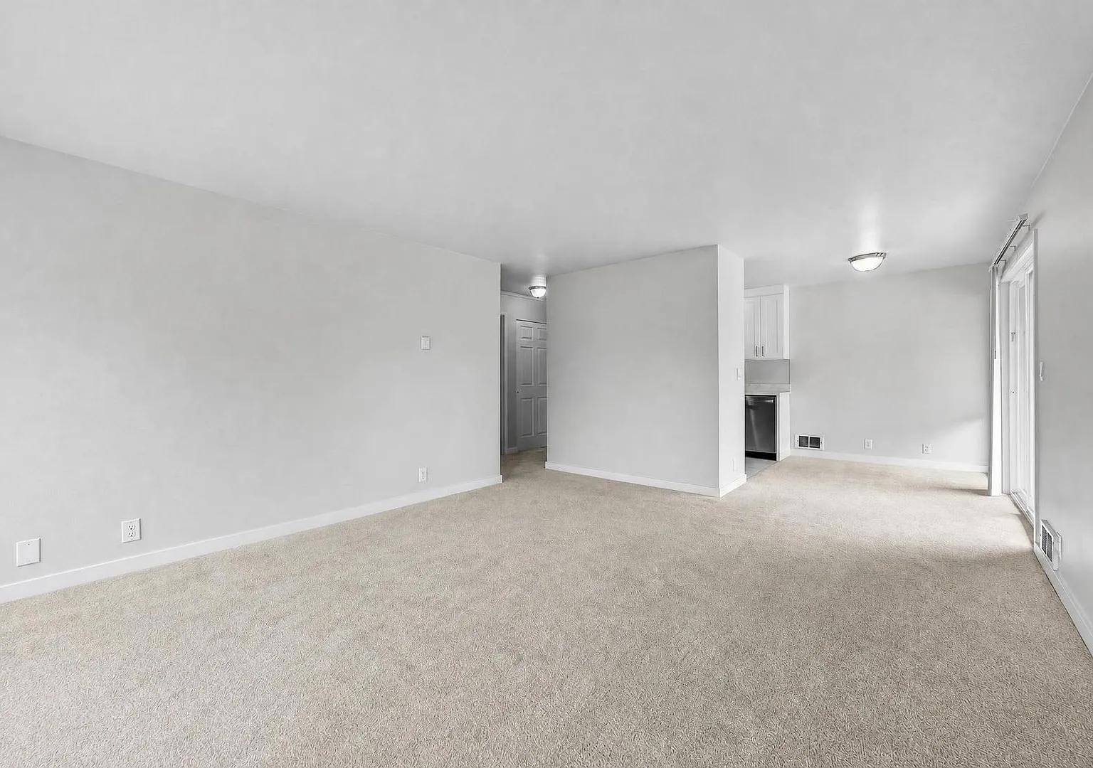 Fully Renovated Sun-Filled Downtown Bellevue Condo with Dual Balconies & Prime Walkable Location — Photo 3