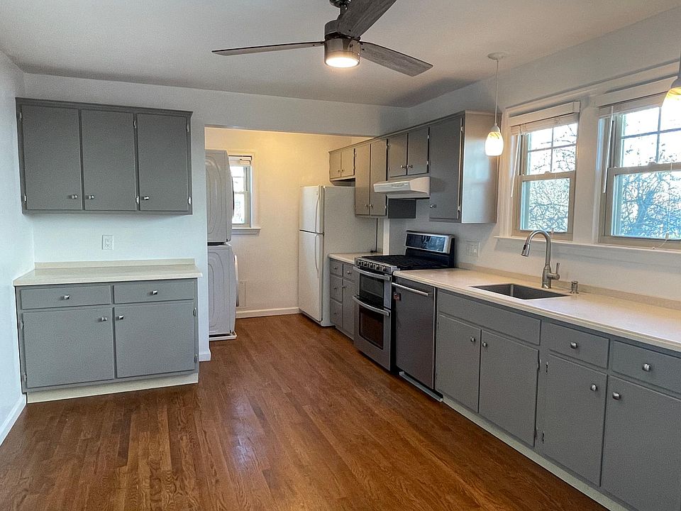 Spacious kitchen with plenty of cabinet storage and counter space.