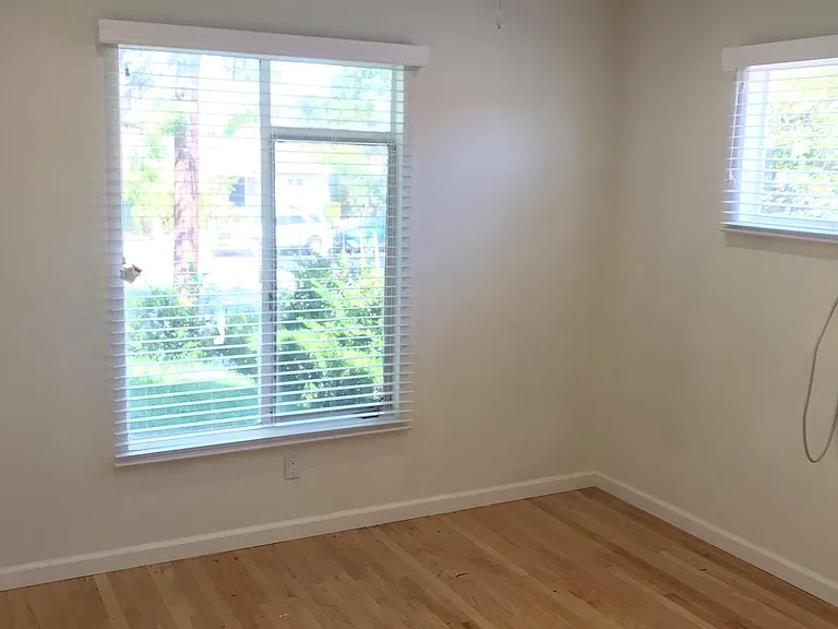 bedroom gets nice light from two windows