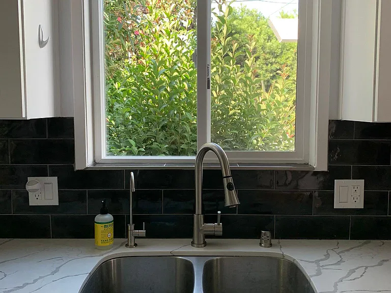 Double sink overlooks garden.