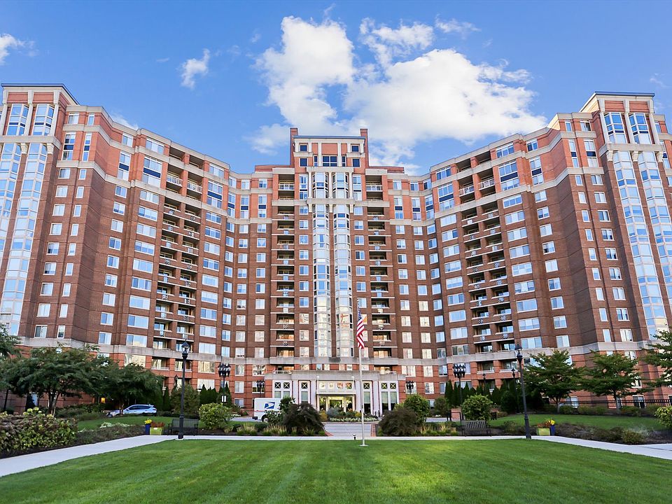 Elegant urban living amidst lush greenery.