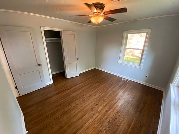 2nd bedroom with lots of natural light hallway closet