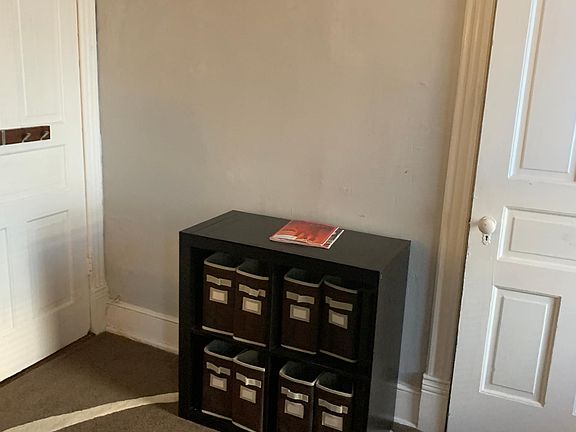 Storage unit next to the closet.