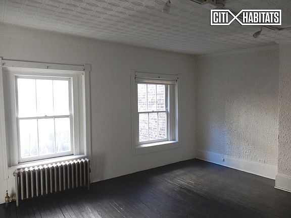 5th image of 117 E 15th St APT 8