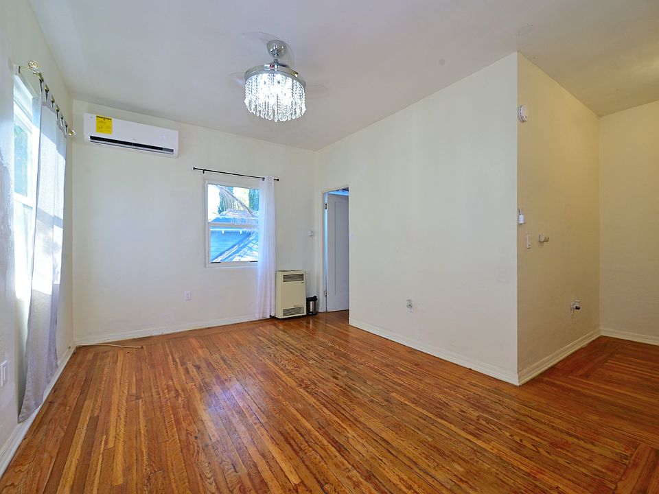 BRIGHT unit with high ceiling + NEW MINI SPLIT A/C, and CRYSTAL ceiling fans in living, and bedroom
