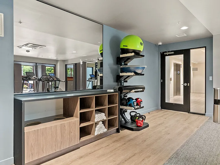 Balance, strength, and serenity: Finding inner peace with yoga and kettle bells in our tranquil corner. _______