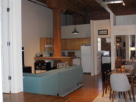 Large open living, dining, and kitchen