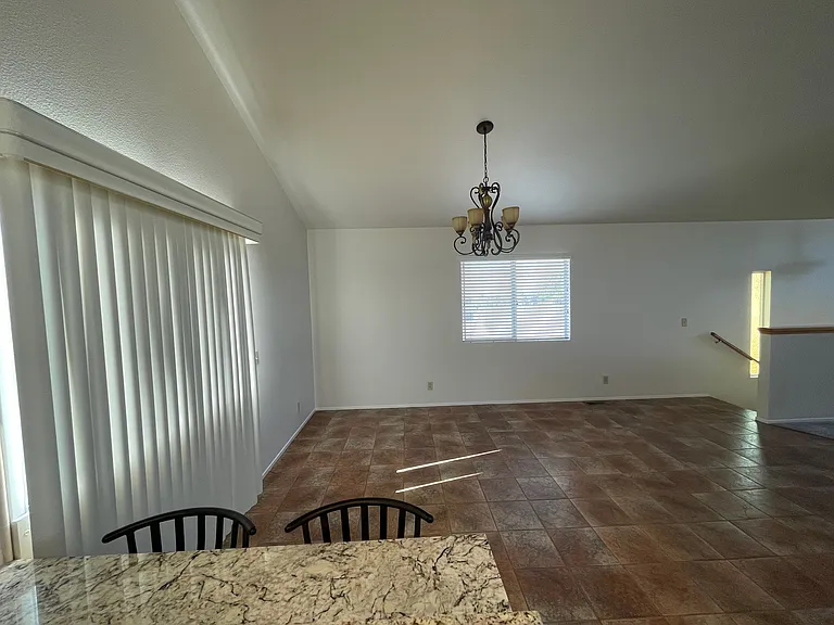 Breakfast bar between dining room and kitchen.