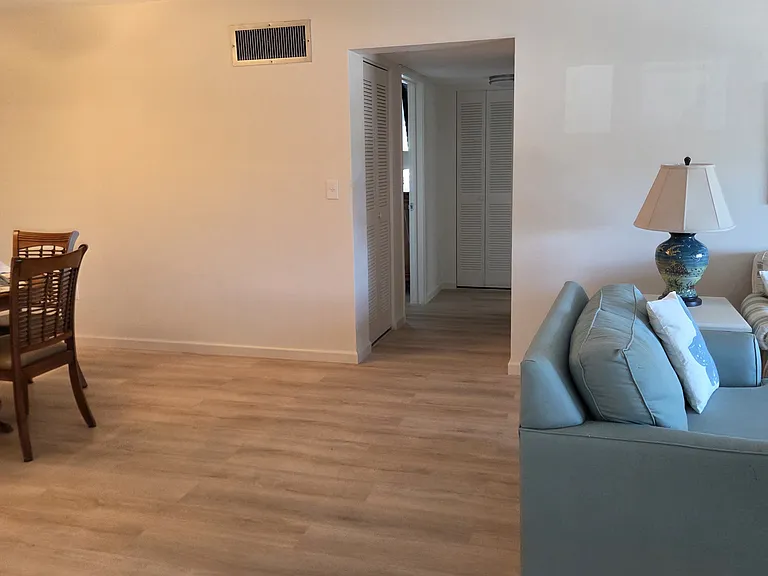 View from doorway from Florida room into dining and living rooms