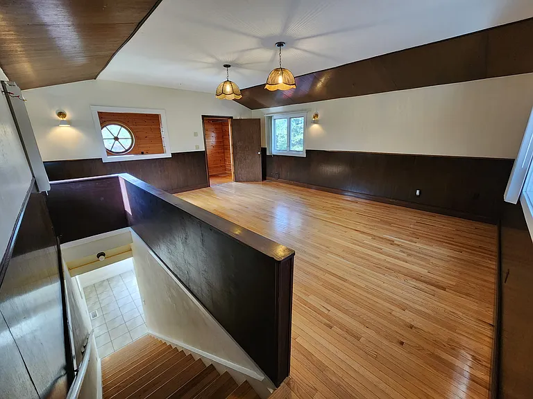 Spacious, grand main living space with mountain views.