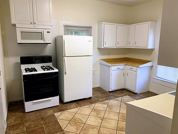 Unit includes fridge, microwave, and oven/stove. *Brand new fridge and oven/stove.*