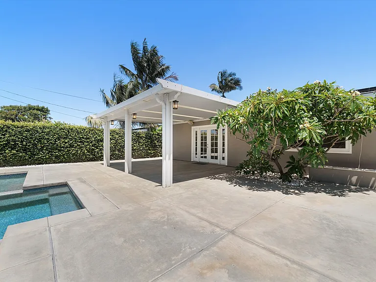 Looking towards dining area. Hot tub on left side