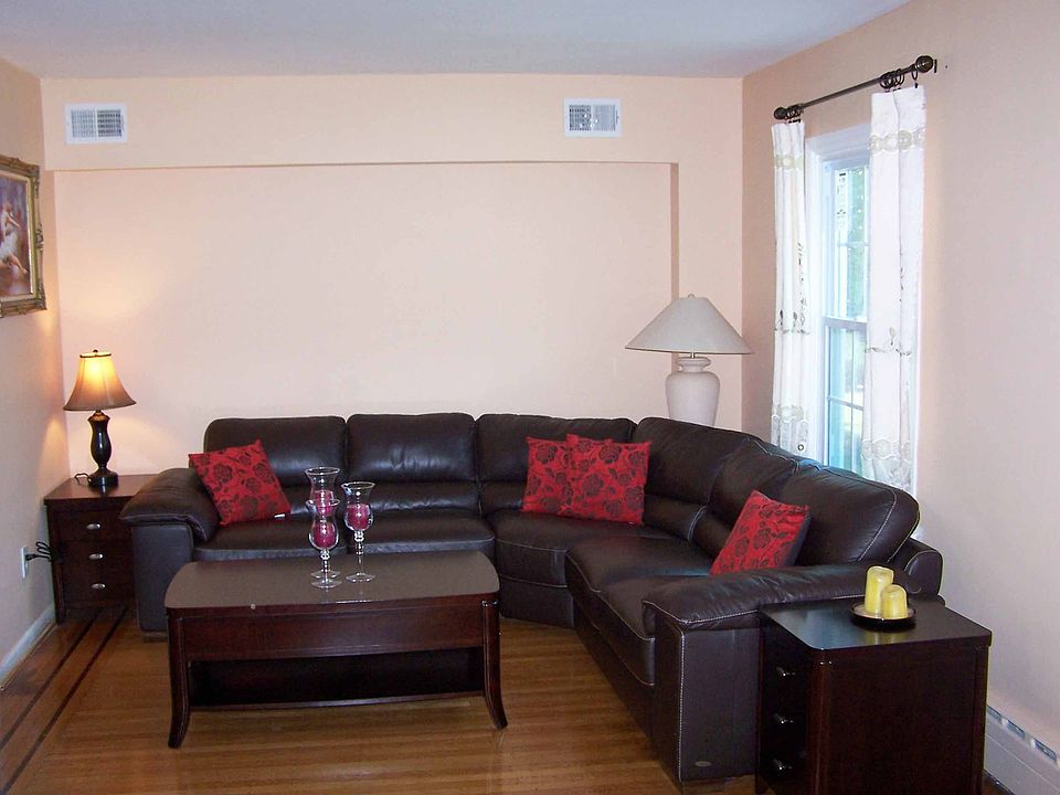 Living Room w/Inlaid Hardwood Flooring & Tall Windows
