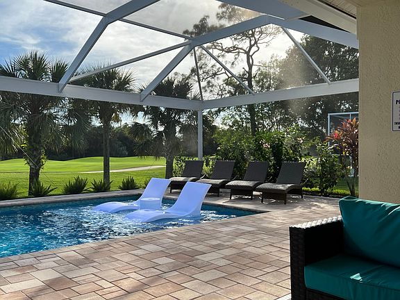All new seating including chairs in the pool on sun shelf next to bubblers and high end Costco outdoor chairs