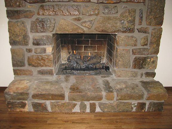 FAMILY ROOM FIREPLACE WITH MANUAL AND THERMOSTATIC CONTROLS