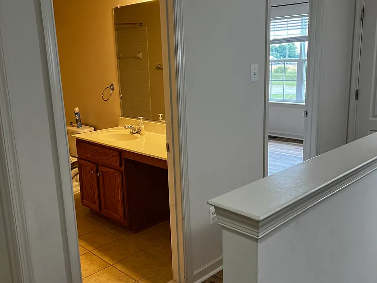 Second floor bathroom (2) with view to fourth bedroom