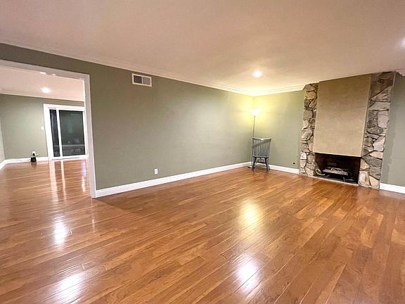 Enter into Living Room w/gas fireplace