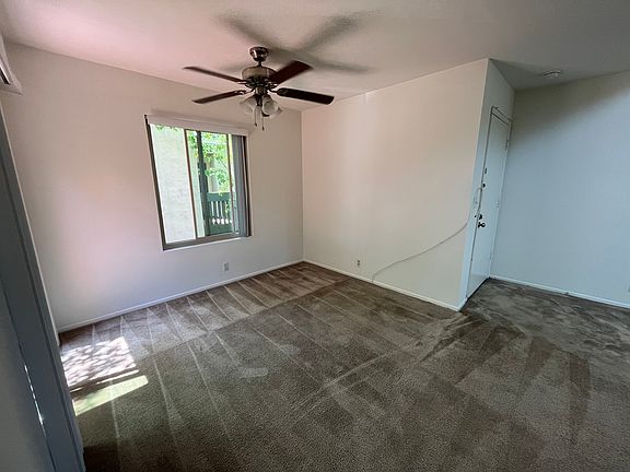 Next to kitchen entrance looking toward dining area.