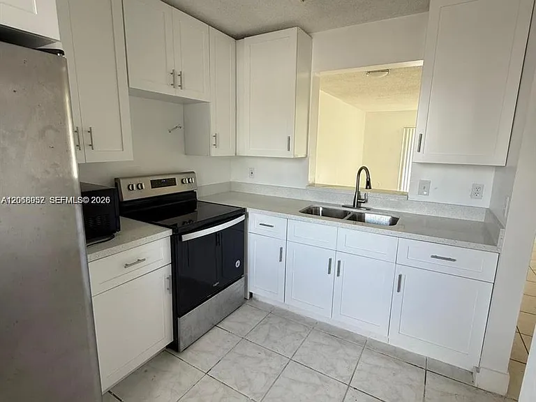 8700 N Sherman Cir #108 — Photo 2