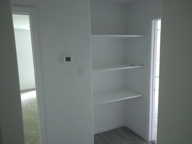 Upper hall to bedrooms & linen storage Unit C