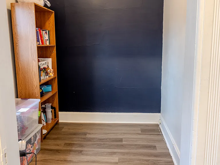 Enjoy natural light in this serene office/den with a window.