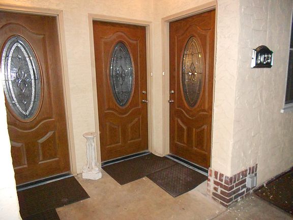 private entry with custom doors