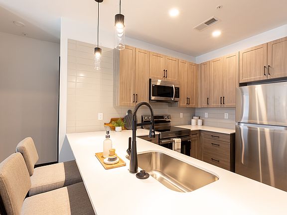 Kitchen with White Quartz Countertops