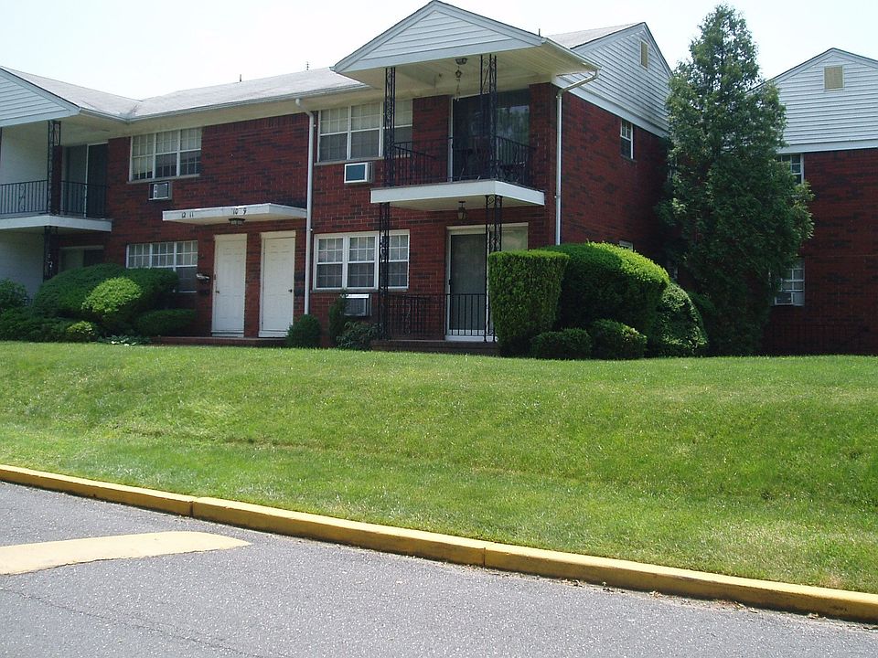 Lower level end unit condo providing up front parking