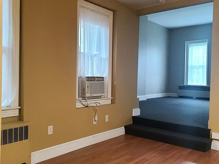 Large dining room; view from kitchen towards the living room
