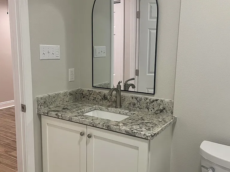 Beautifully renovated en-suite bathroom, featuring all-new amenities for a luxurious and modern experience.