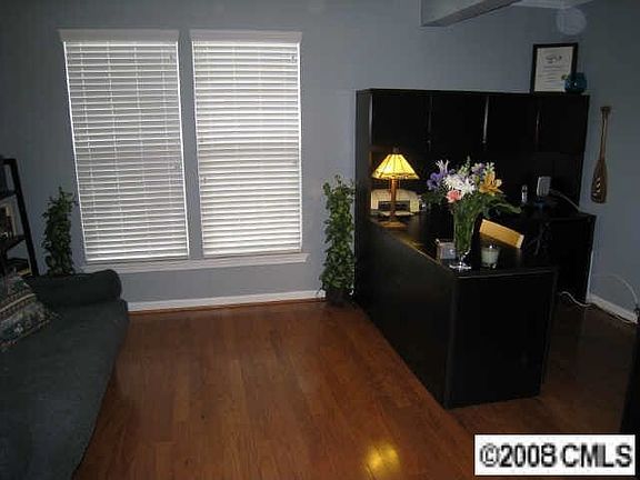 Main level study with hardwoods and 1/2 bath - use it for anything!